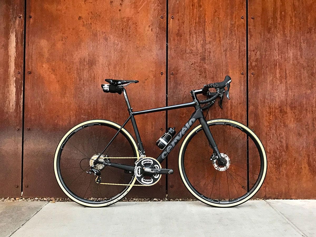 Road bike leaning against a wall