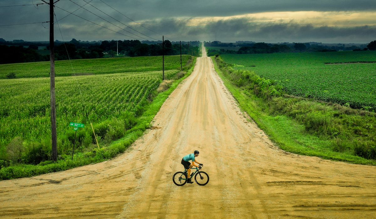 Cyclist riding on gravel