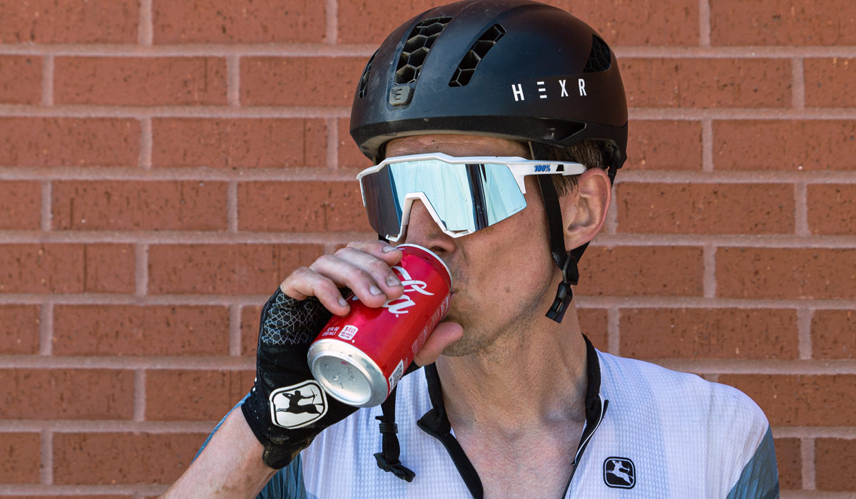 Cyclist drinking Coca Cola