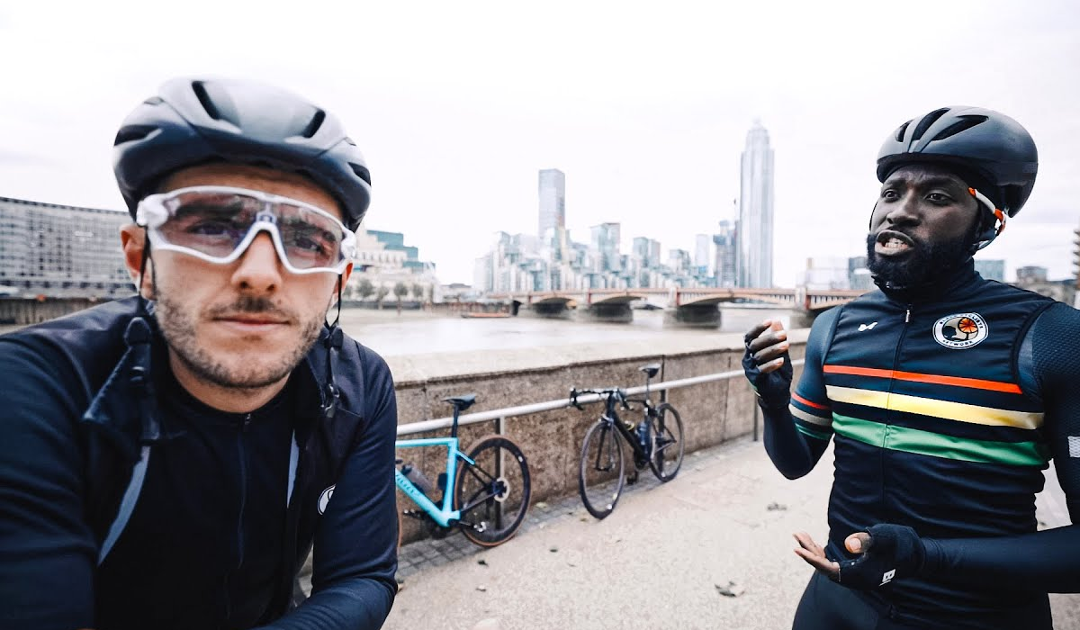 Two cyclists talking