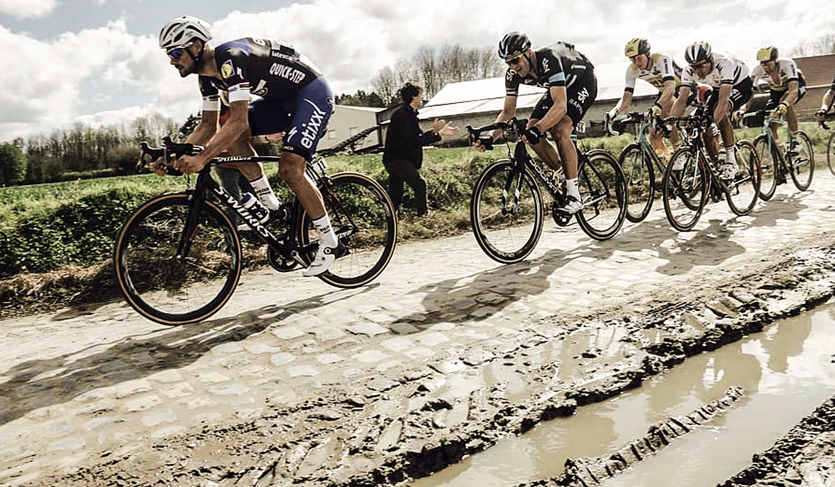 Cyclists riding Paris Roubaix bike race