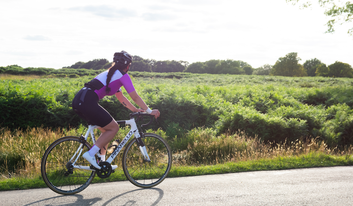 Woman cycling on Pinarello