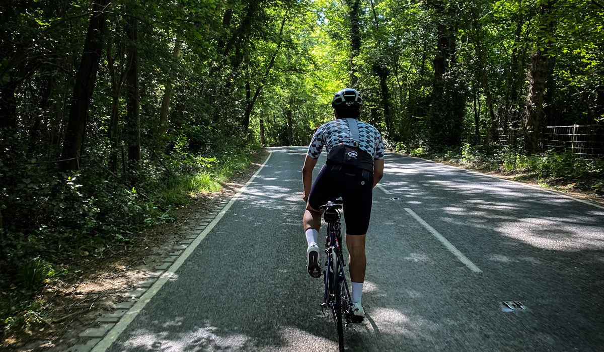 Cyclist riding uphill