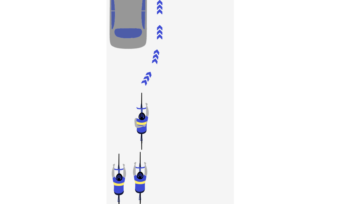 Cyclist signalling to avoid obstacle arm behind back