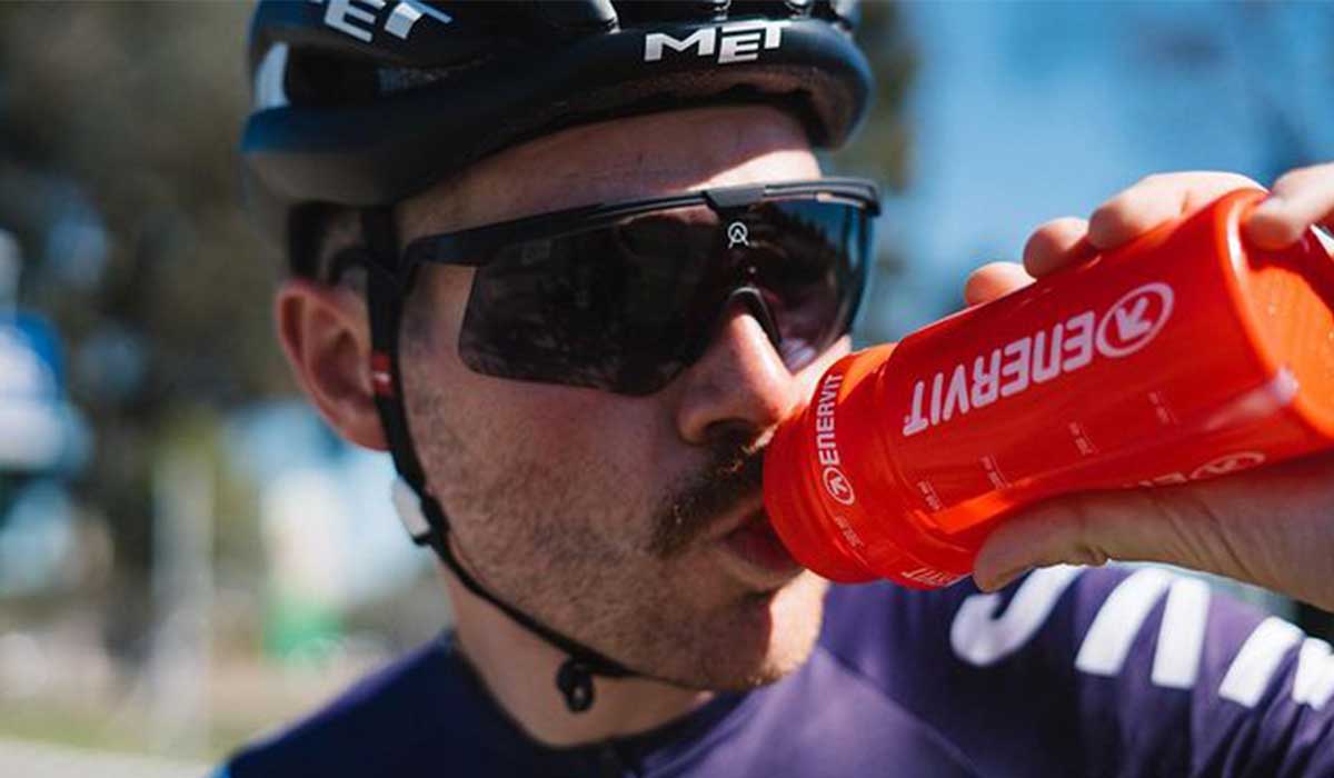 Cyclist drinking energy drink