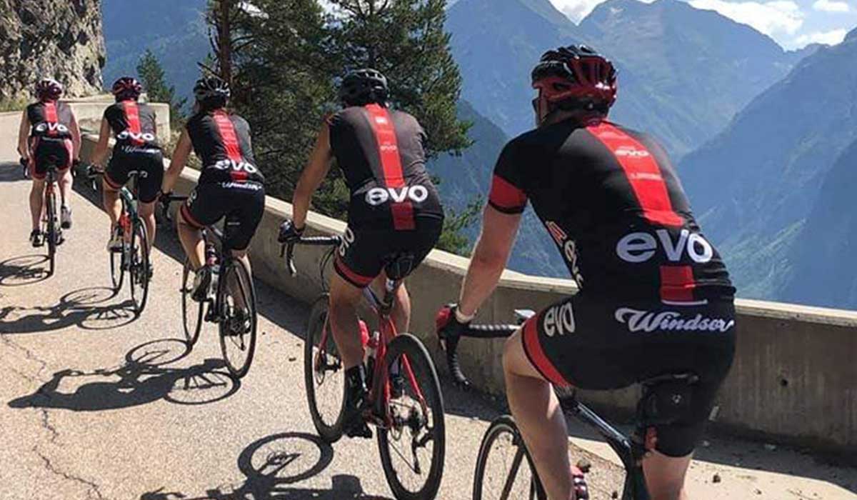 Cyclists cycling in the alps