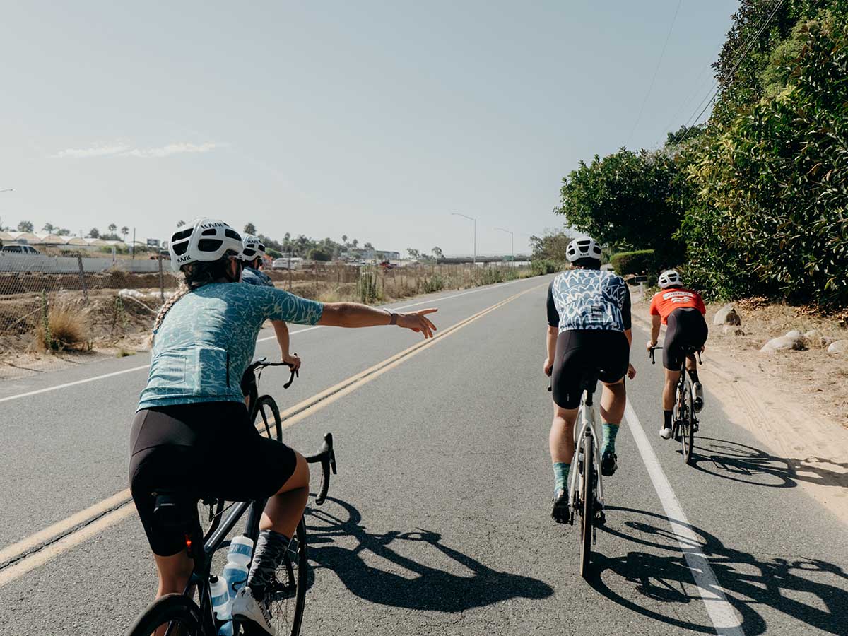 Cyclists riding in a group on the road