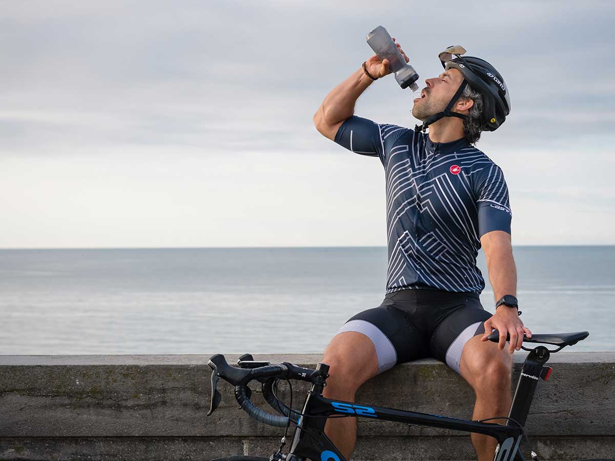 Cyclist drinking from bottle