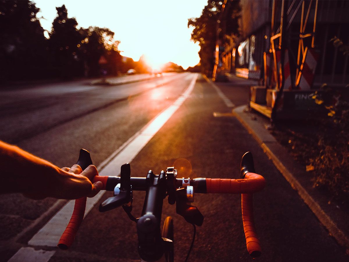 Cyclist riding at dusk
