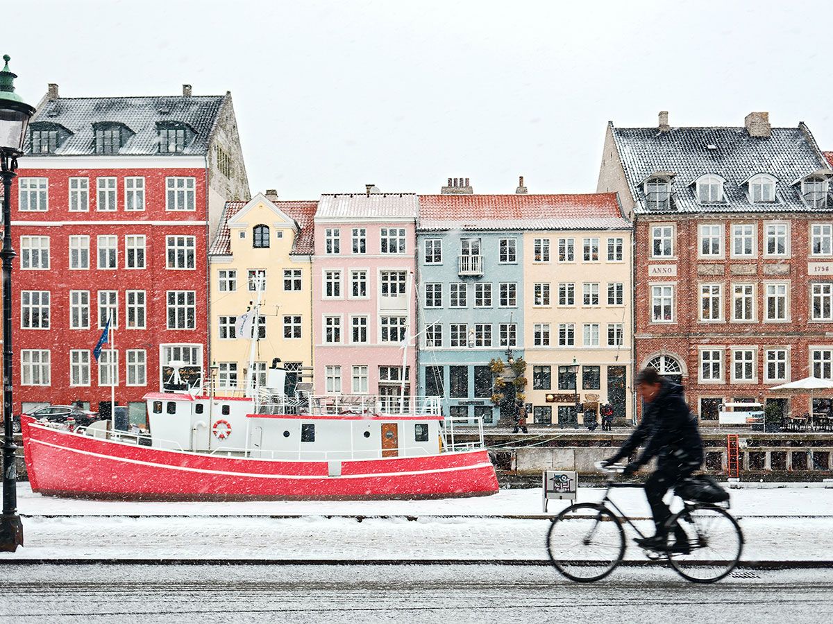 Cyclist riding in the snow in Copenhagen
