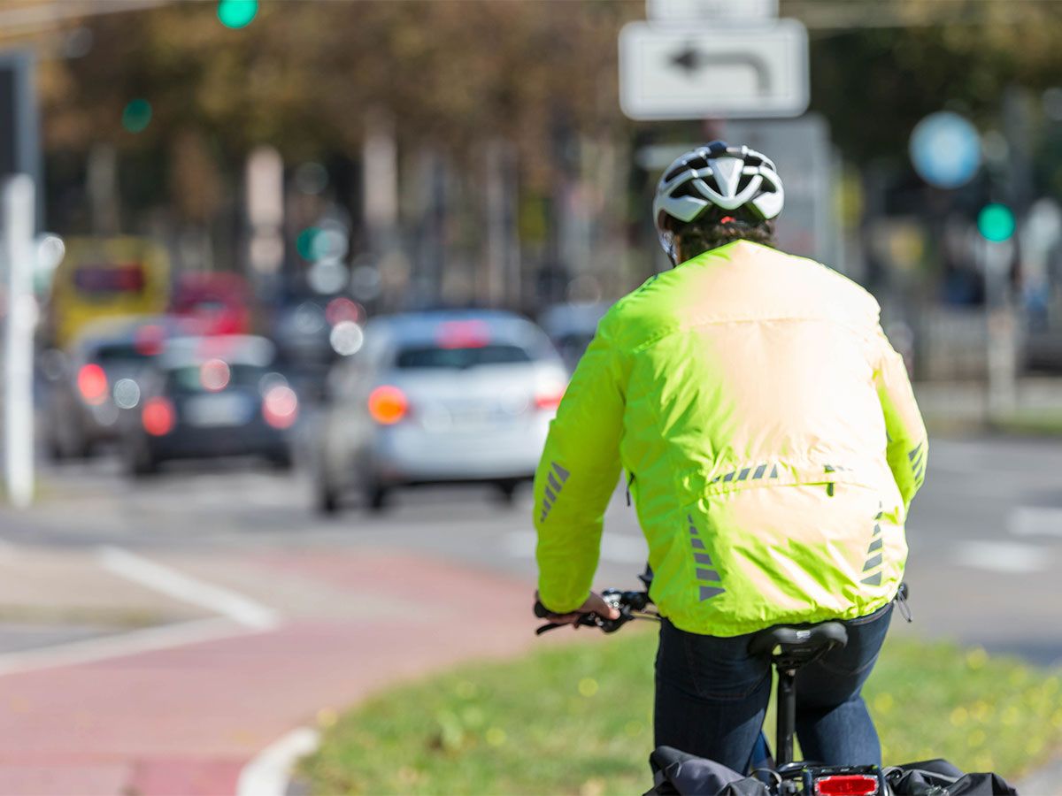 Cyclist in reflective jacket