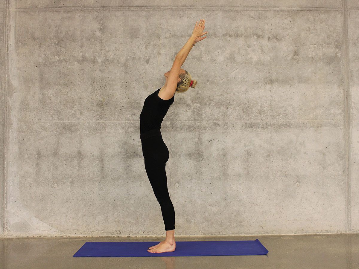 Women stretching on yoga mat